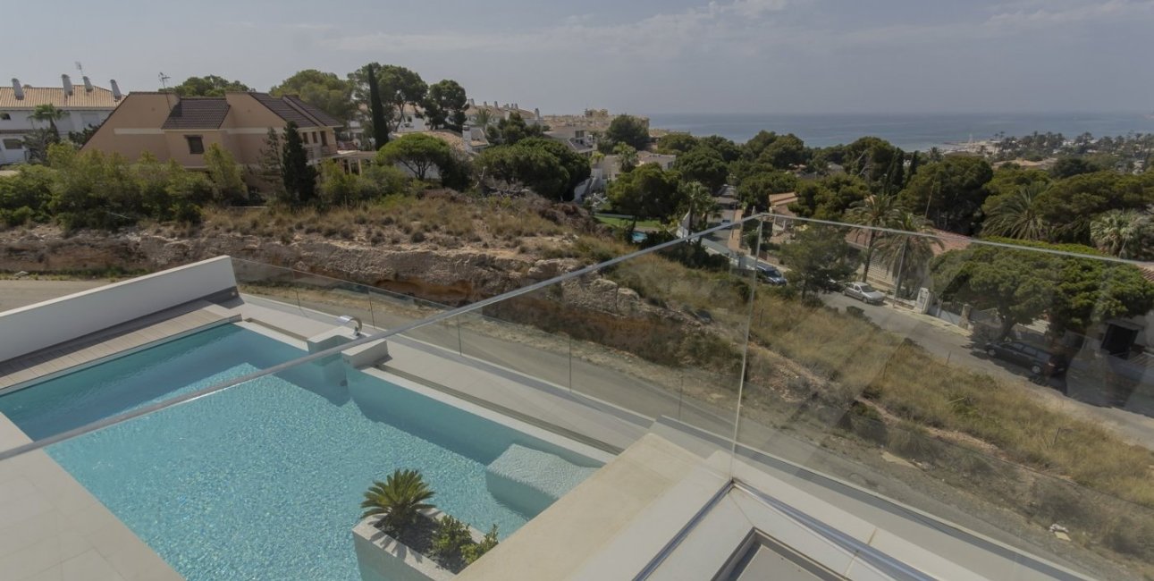 Obra nueva - Villa -
Orihuela Costa - Campoamor