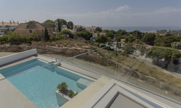 Obra nueva - Villa -
Orihuela Costa - Campoamor