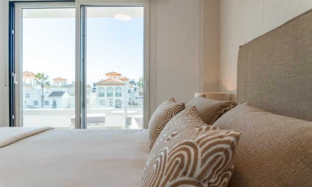 Obra nueva - Apartamento / piso -
Orihuela Costa - Playa Flamenca